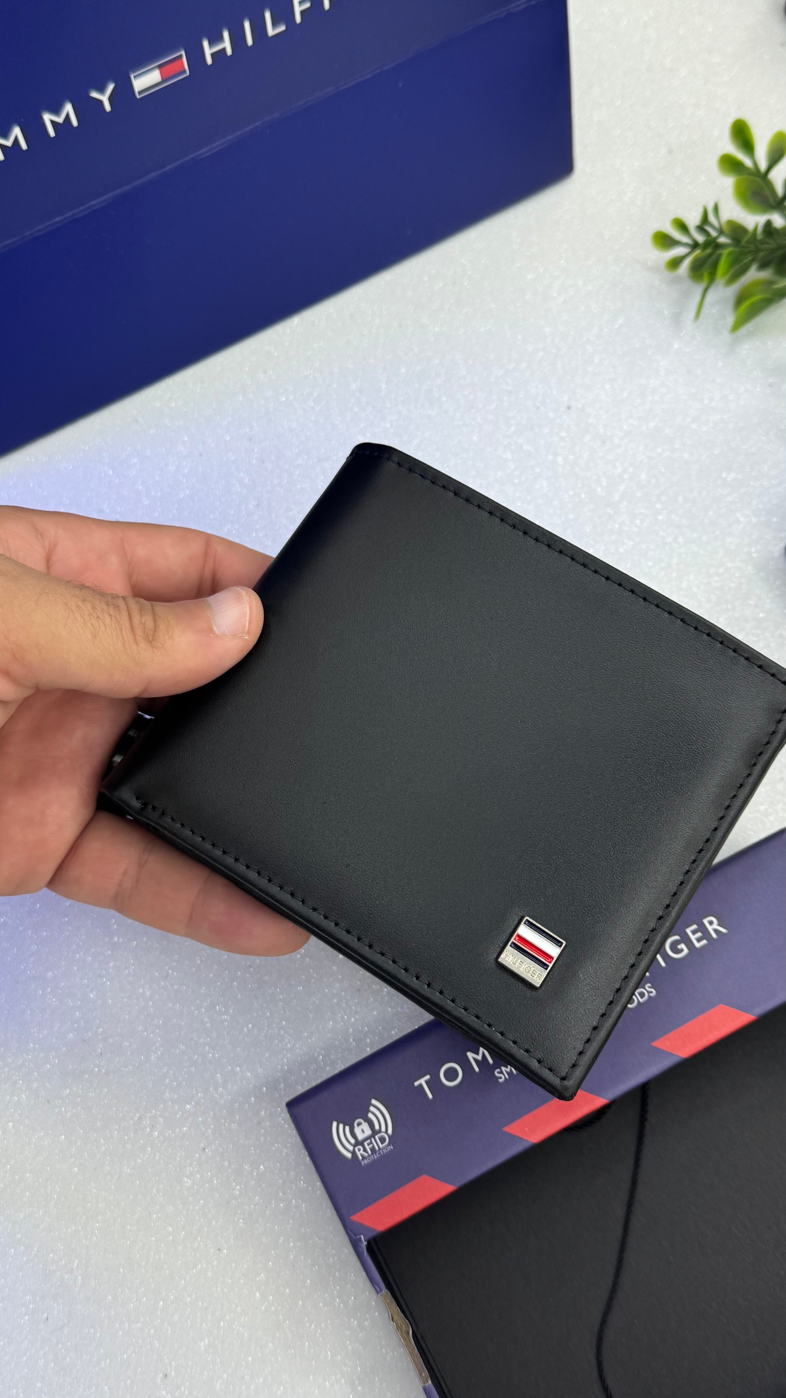 Tommy wallet.100
